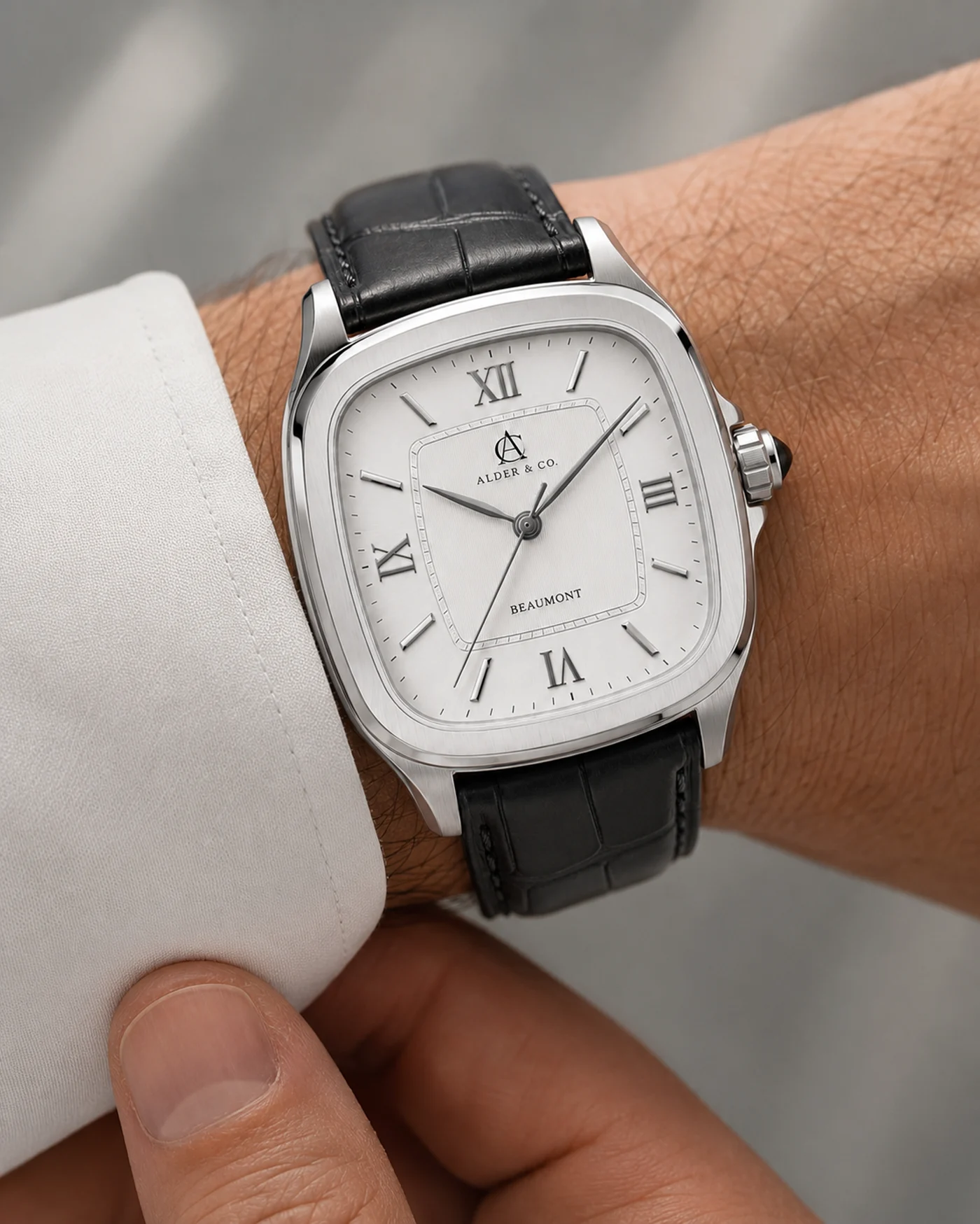 The Beaumont worn on the wrist at sunset on a terrace